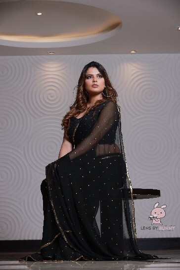 Elegant Black Georgette Party Wear Saree with Golden Border