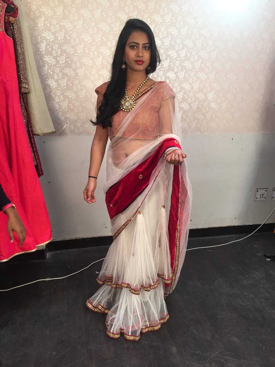 Designer White Net Saree with Red Velvet Border and Peach Blouse