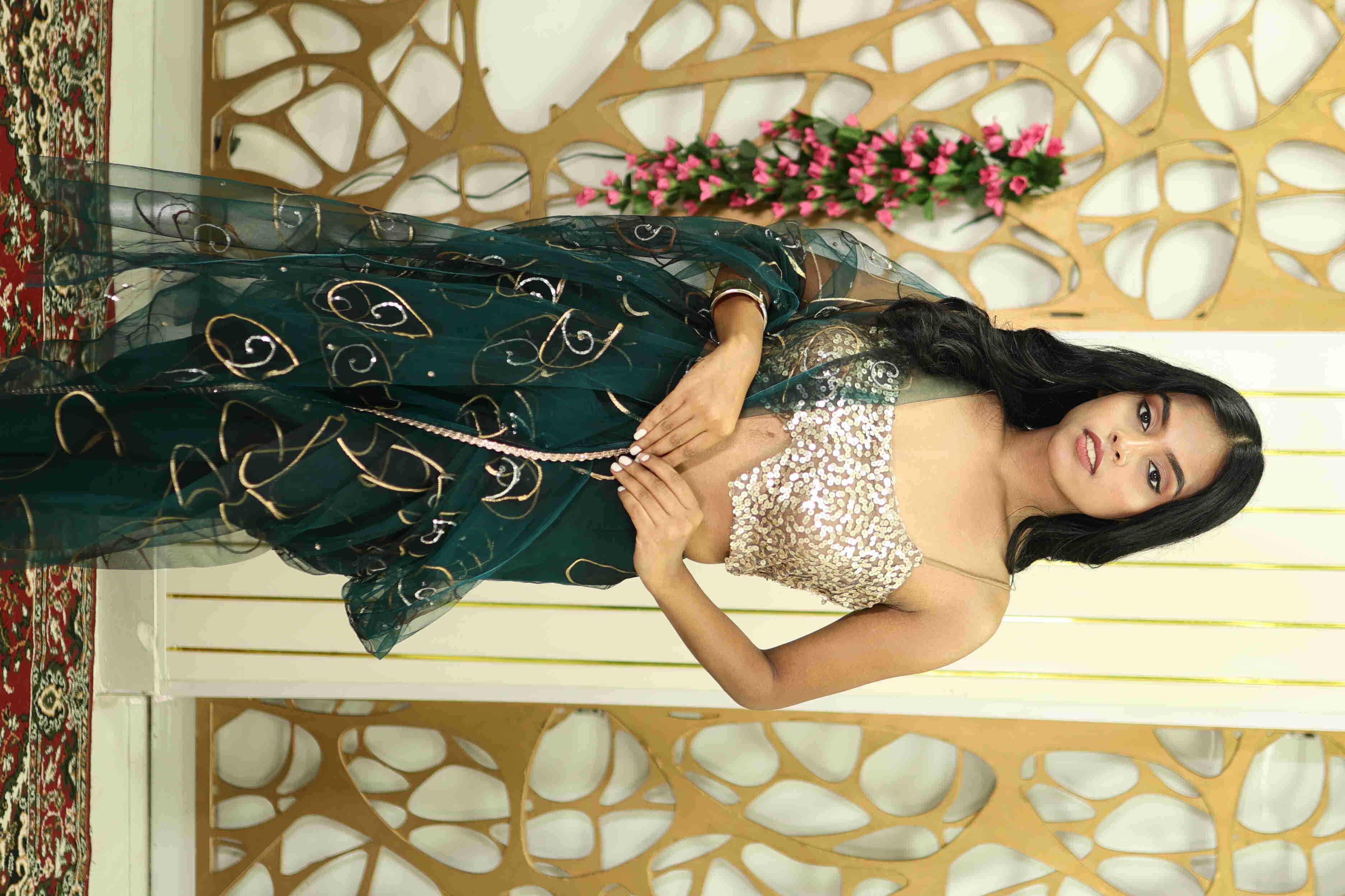 Emerald Green Net Saree with Golden Sequin Blouse