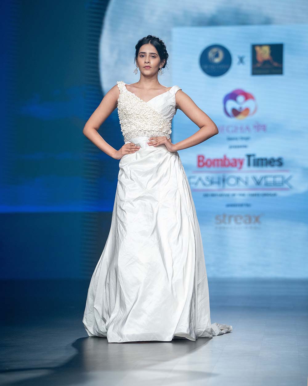 White One-Shoulder Elegant Bridal Gown with Pearl Detailing