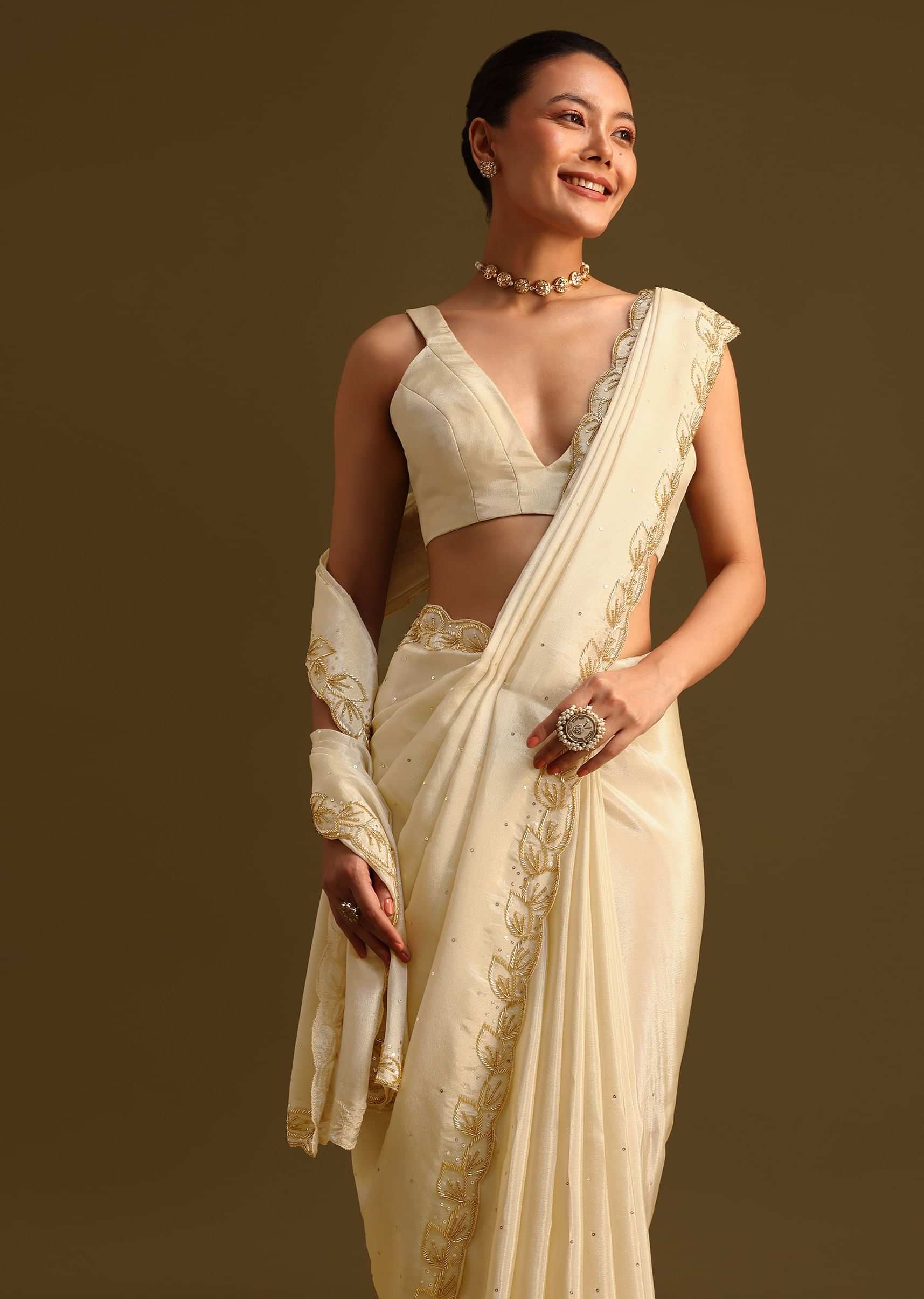 Ivory Tissue Saree With Cutdana Embroidered Border and Unstitched Blouse