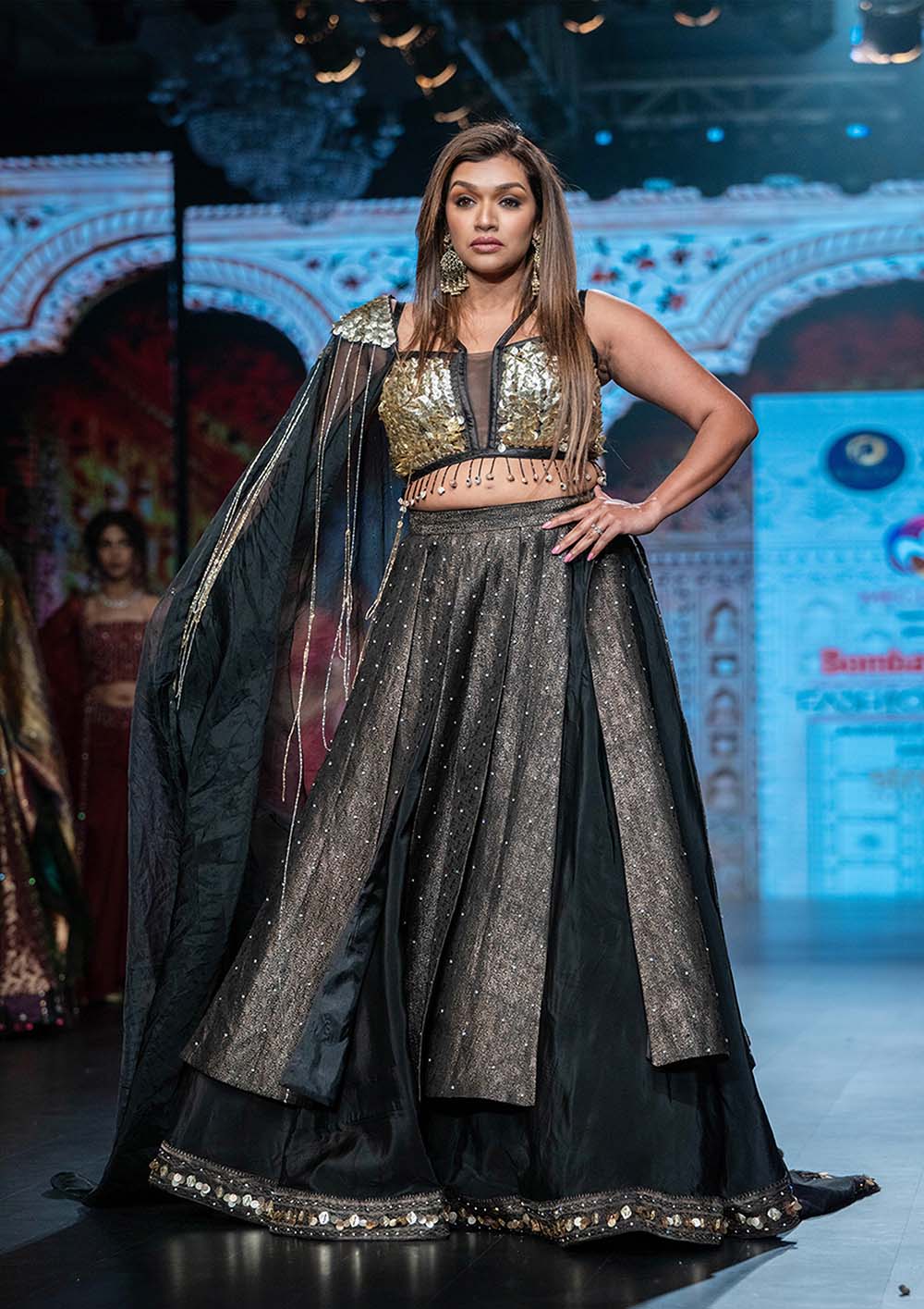 Designer High-Low Lehenga in Crepe & Pure Banarasi Silk with Hand Embroidered Blouse and Organza Sleeve