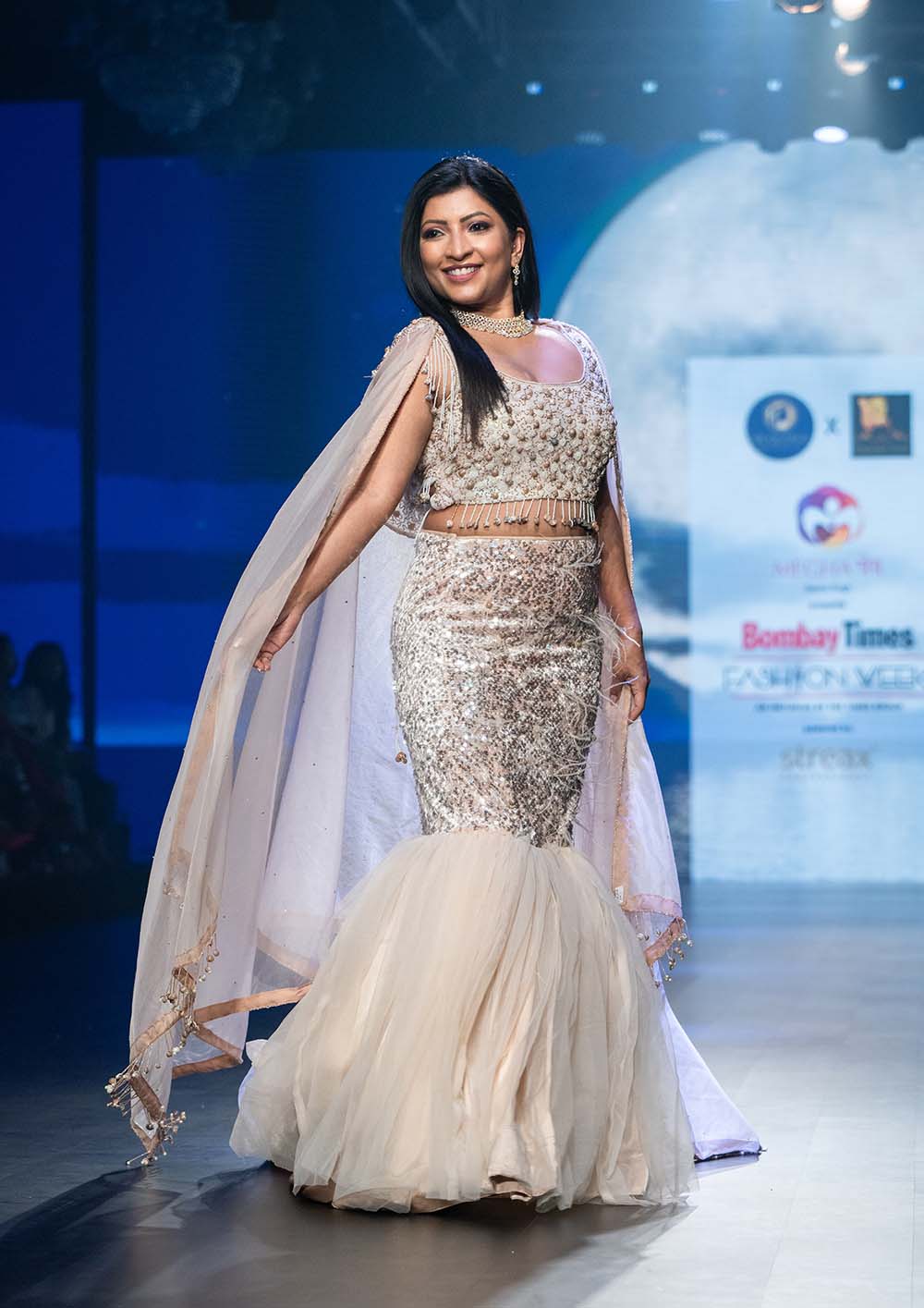 Light Pinkish Cream Designer Net Lehenga with Heavy Handwork, Feather Detailing & Organza Dupatta