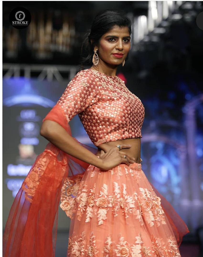 Designer Peach Embroidered Net Lehenga Choli with Mirror Work Blouse