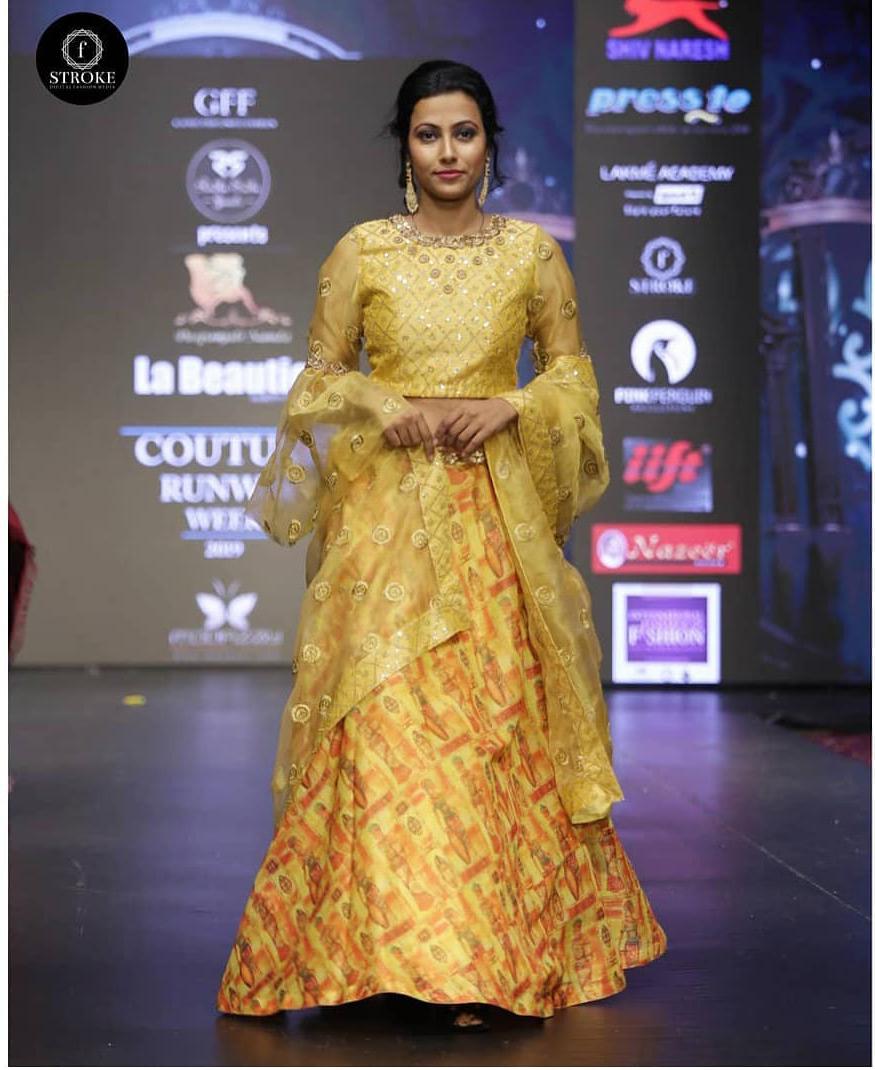 Mustard Yellow Printed Lehenga with Embroidered Net Jacket Blouse