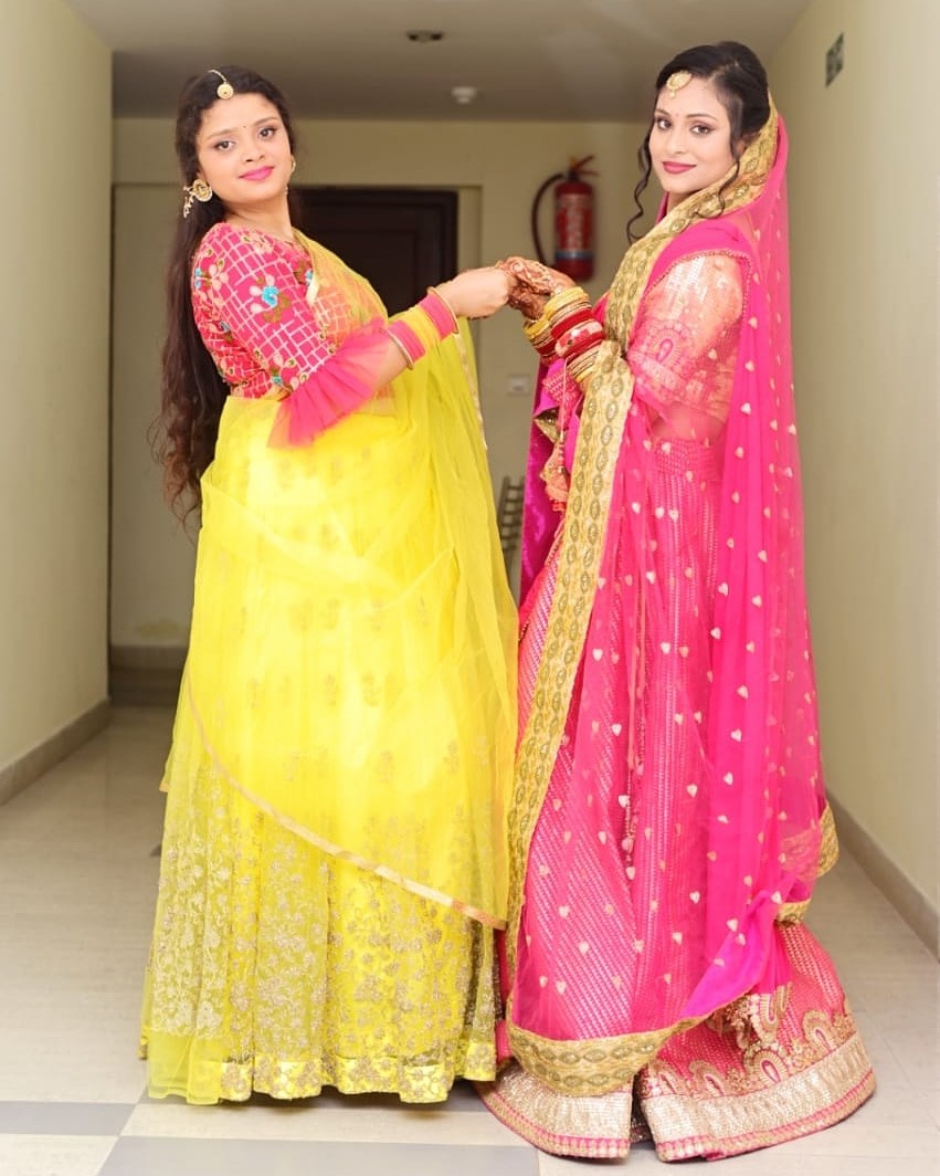 Yellow Net Embroidered Lehenga with Pink Embroidered Blouse & Dupatta