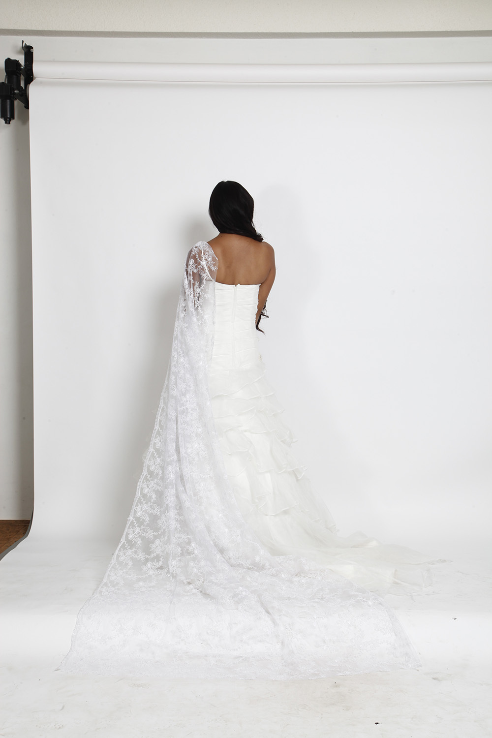 White Strapless Layered Wedding Gown with Floral Embellishments