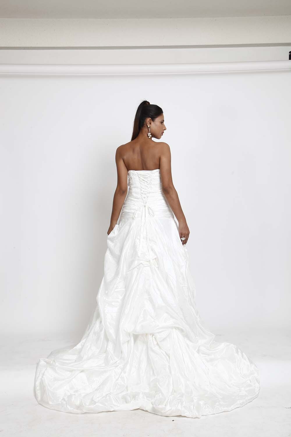 White Strapless Bridal Gown with Ruched Detailing