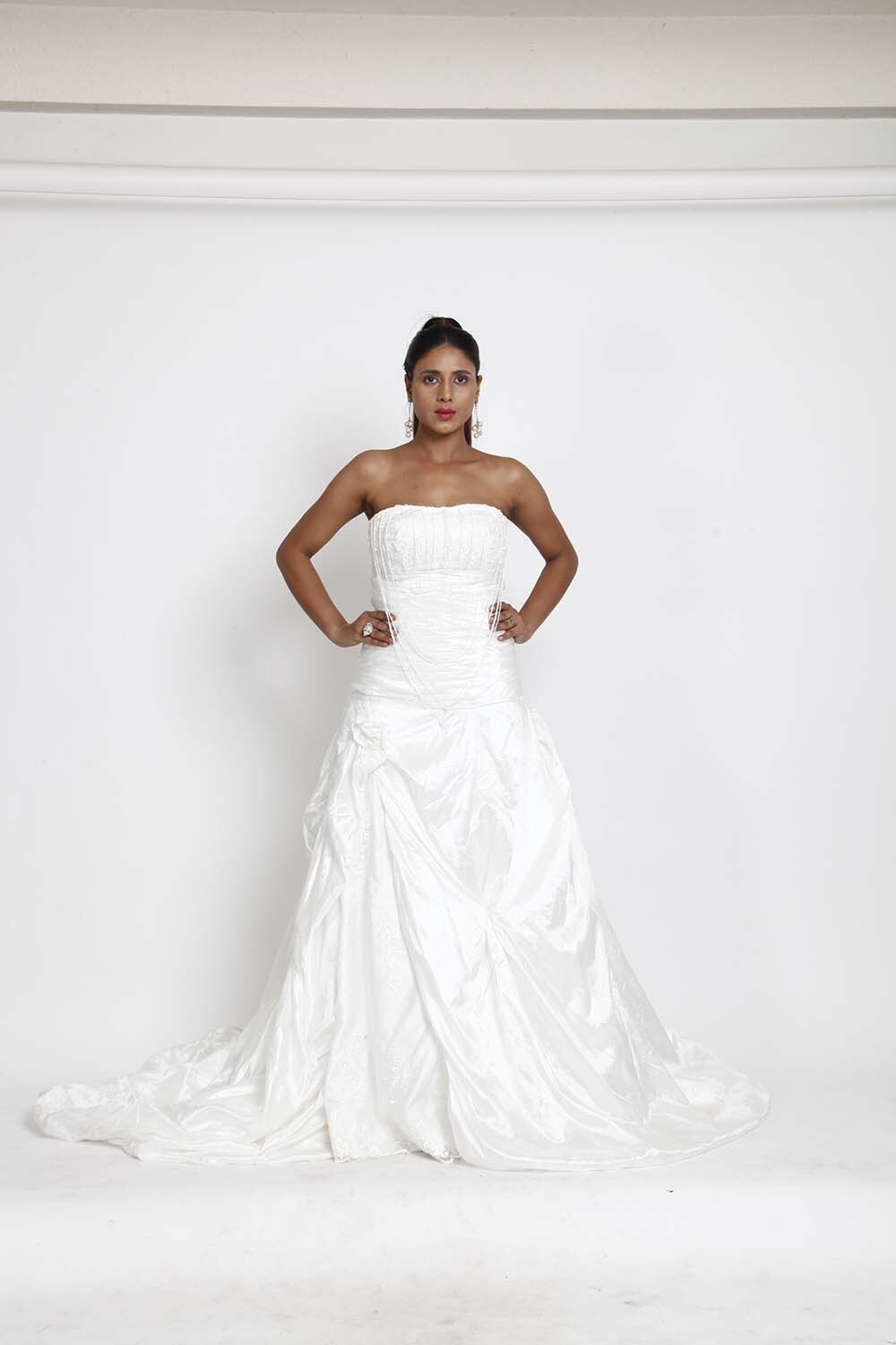 White Strapless Bridal Gown with Ruched Detailing