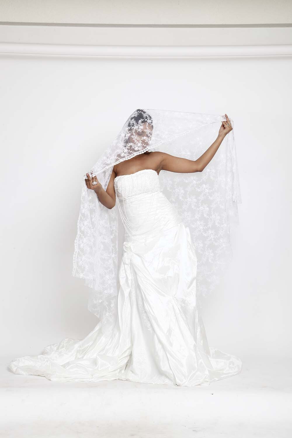 White Strapless Bridal Gown with Ruched Detailing