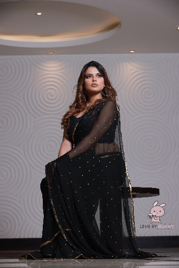 Elegant Black Georgette Party Wear Saree with Golden Border