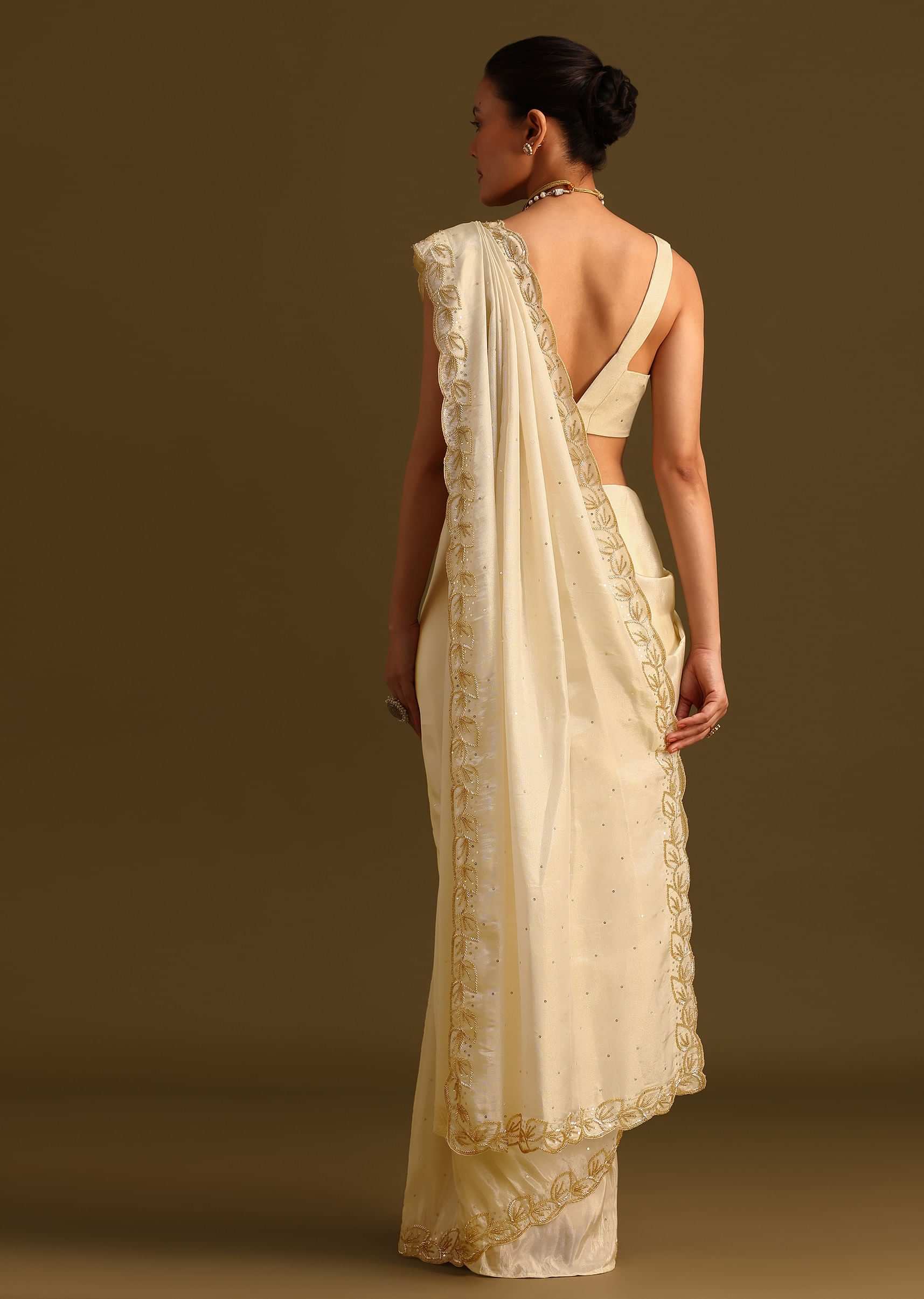 Ivory Tissue Saree With Cutdana Embroidered Border and Unstitched Blouse